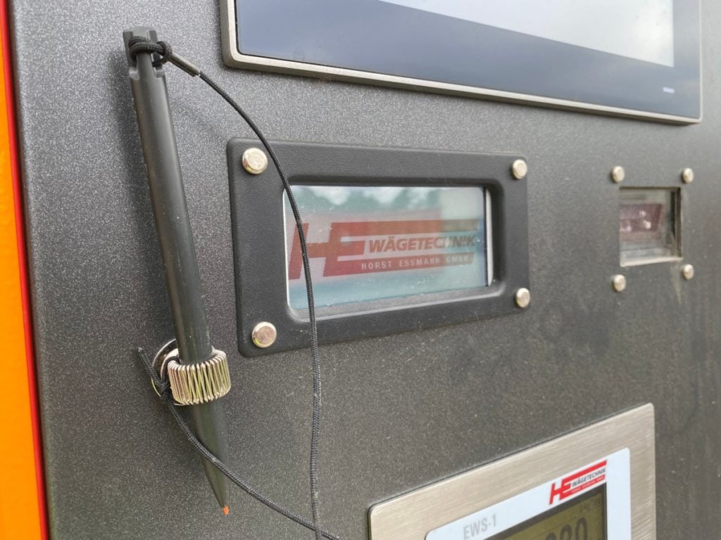 Wettelijk handtekeningblok en barcode/QR-code scanner.